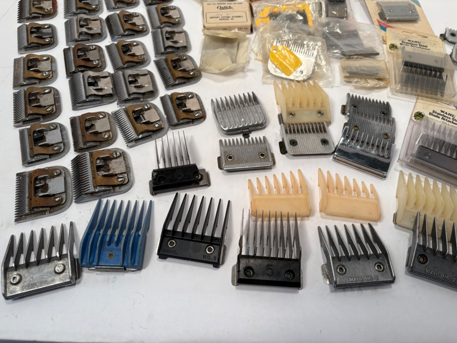 (12) Wahl, Andis, Oster Hair Cutting Clippers and (42) Blades Lot