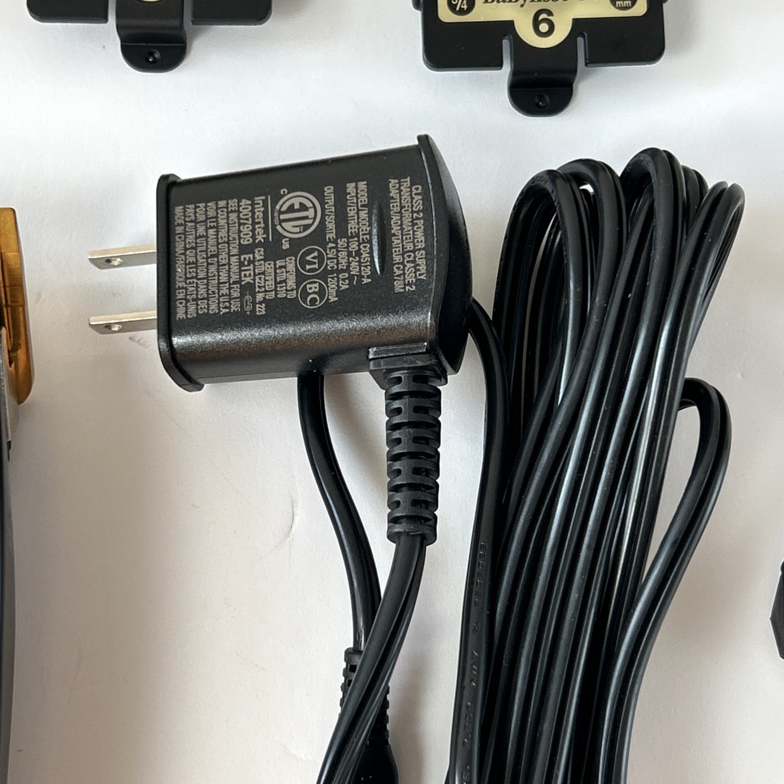 BaBylissPRO LithiumFX+ Cord/Cordless Black Gold Ergonomic Clipper FX673NS