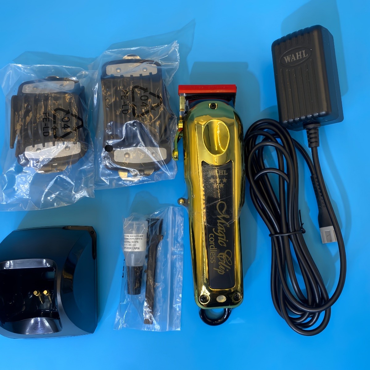 Wahl Professional 5 Star Cordless GOLD MAGIC CLIP Clipper w/ Stand 8148-700