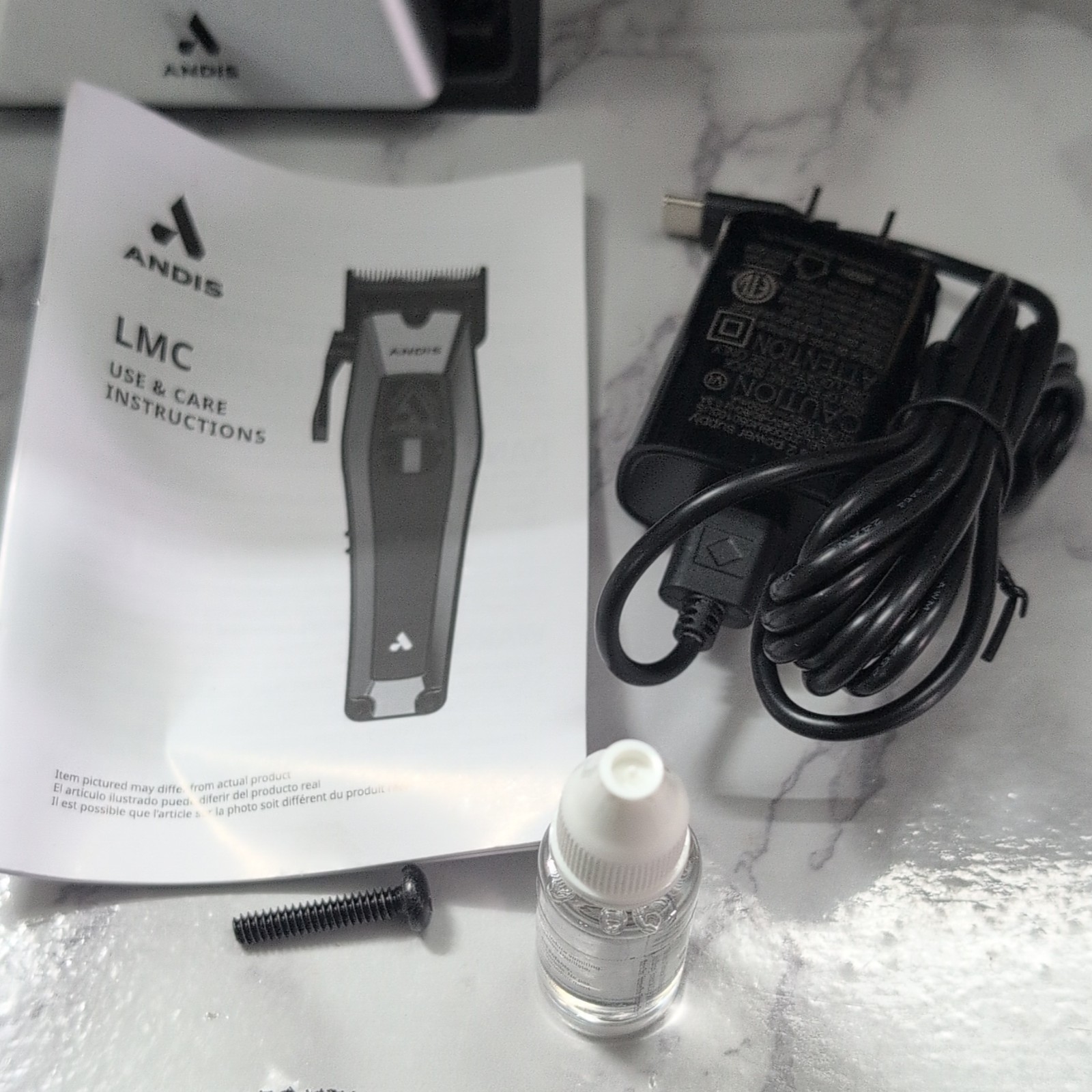 Andis RECON Clipper Black/Silver Cordless Rechargeable Rotary Square Blade