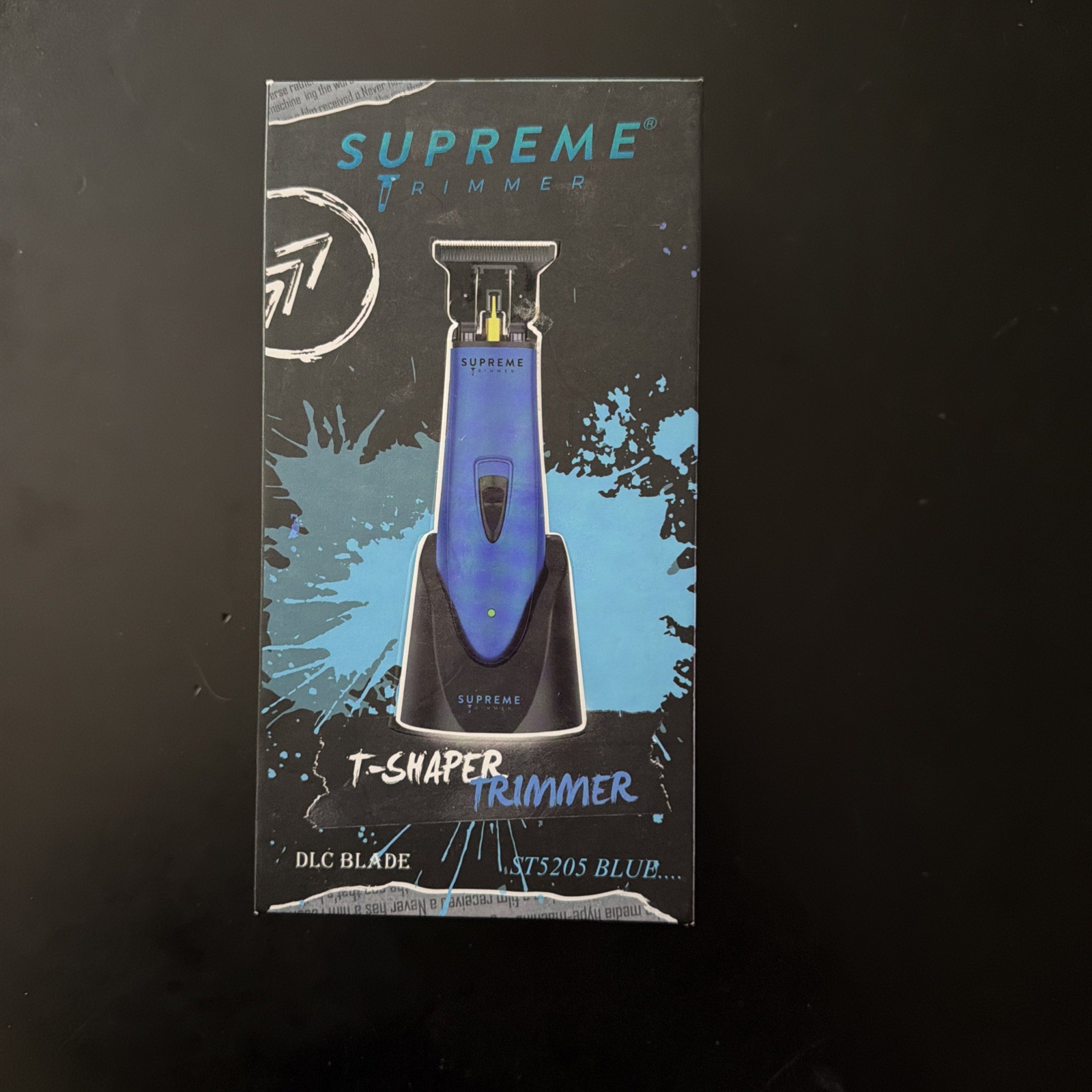 Supreme Trimmer T-Shaper cordless hair trimmer in blue, featuring a DLC blade