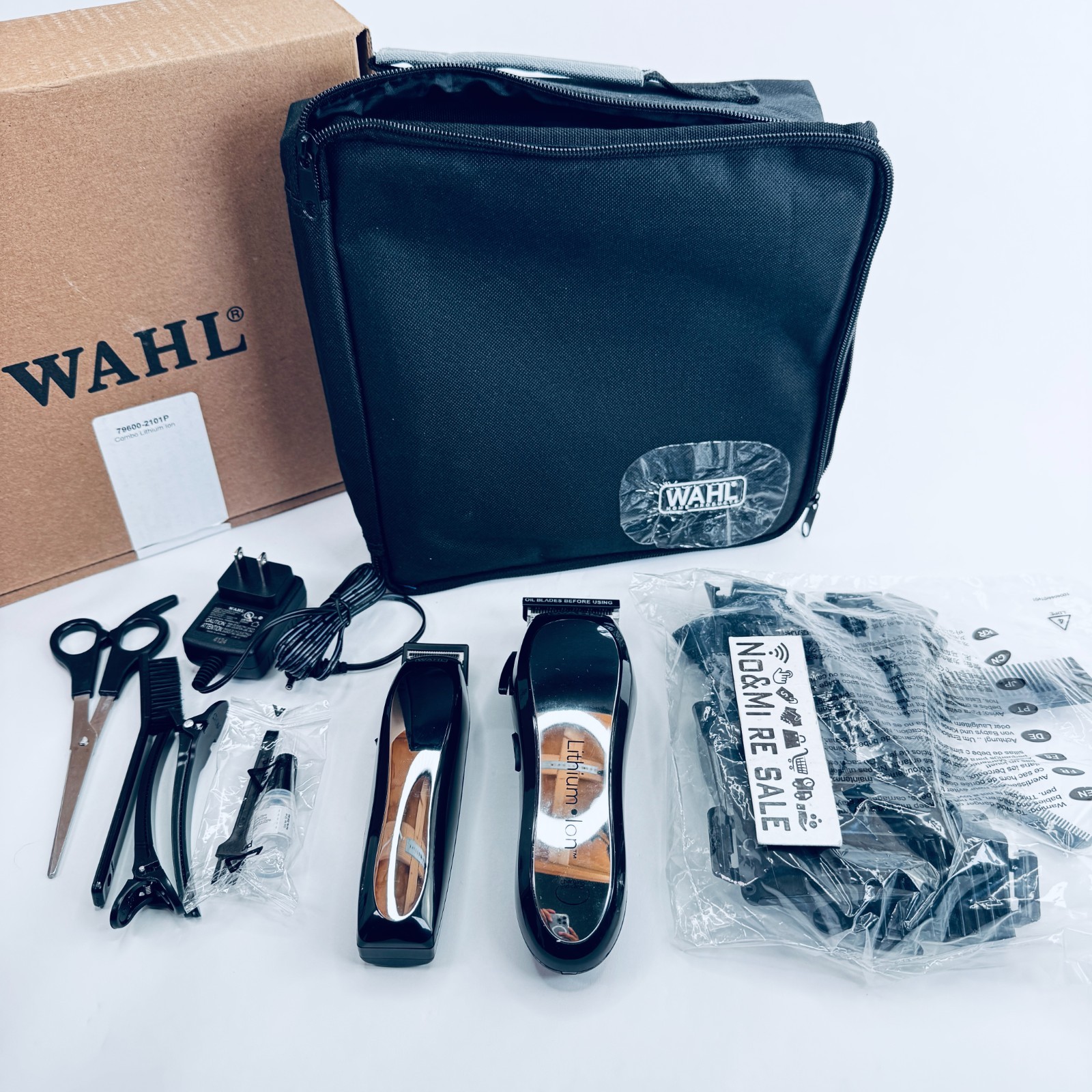 Wahl Clipper Lithium Ion Cordless Haircutting & Trimming Combo Kit. 79600