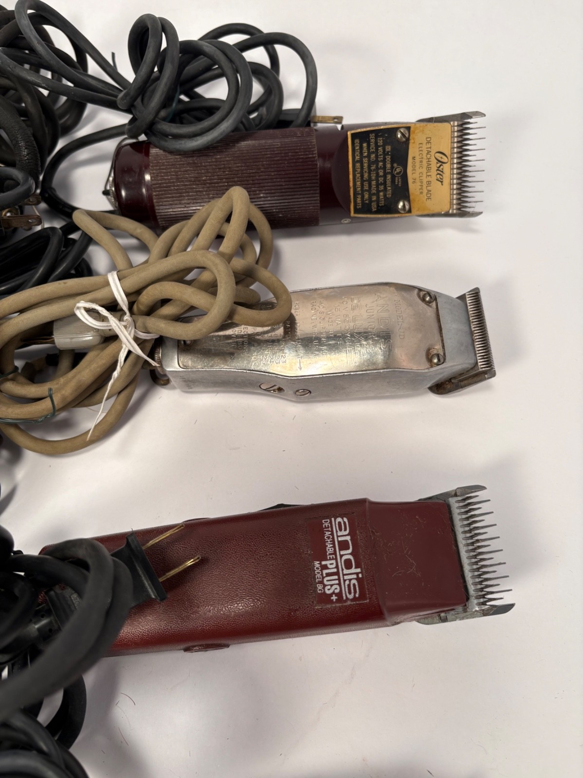 (12) Wahl, Andis, Oster Hair Cutting Clippers and (42) Blades Lot