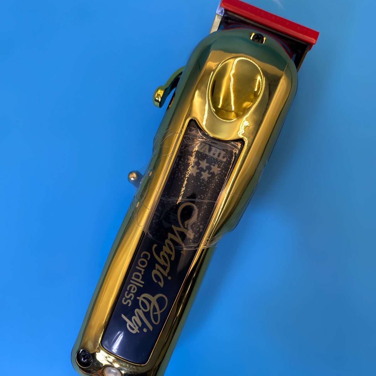 Wahl Professional 5 Star Cordless GOLD MAGIC CLIP Clipper w/ Stand 8148-700