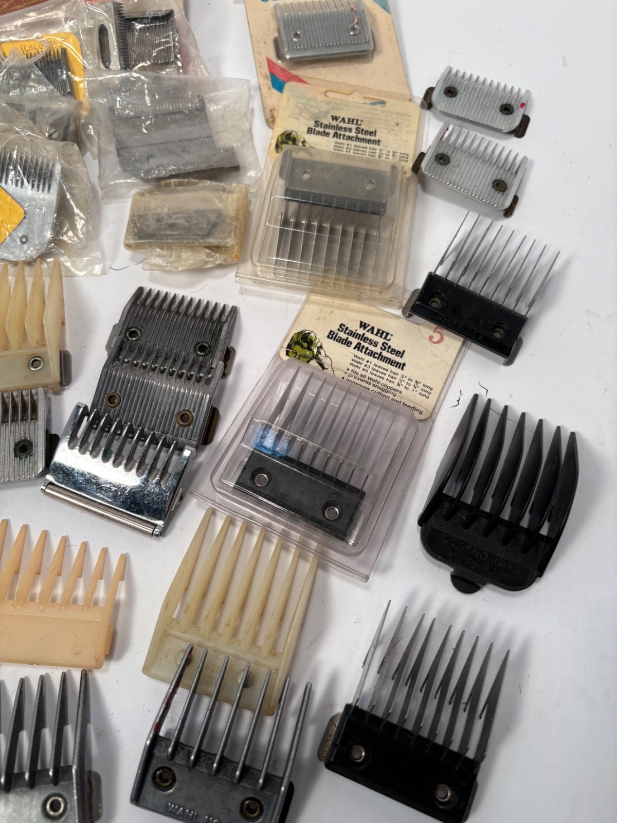 (12) Wahl, Andis, Oster Hair Cutting Clippers and (42) Blades Lot