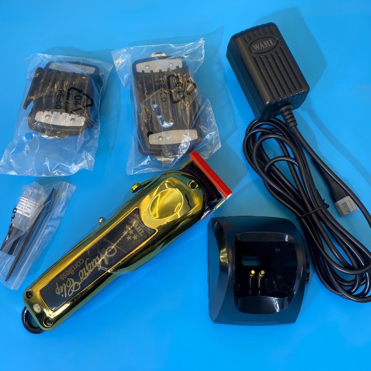 Wahl Professional 5 Star Cordless GOLD MAGIC CLIP Clipper w/ Stand 8148-700