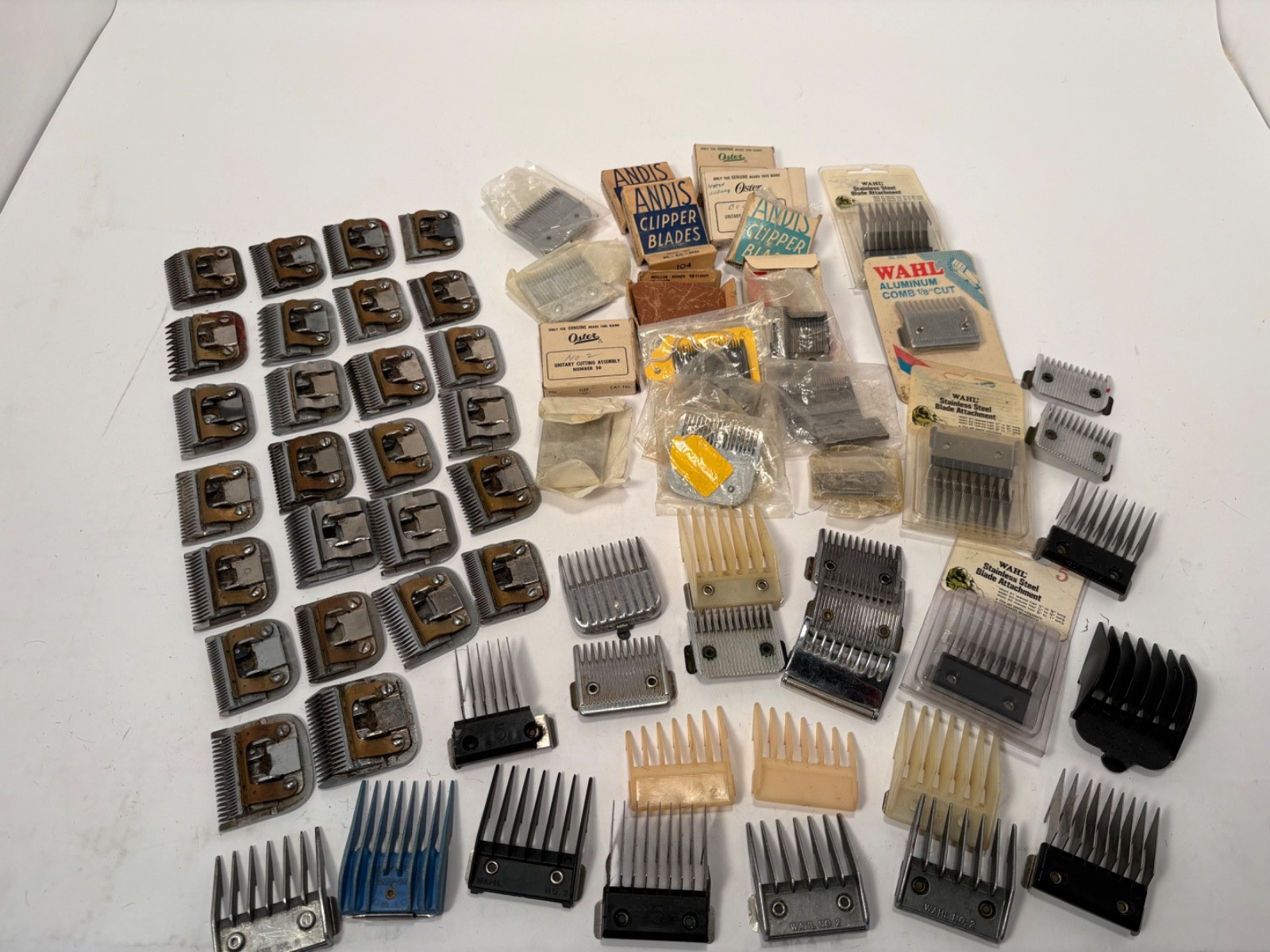(12) Wahl, Andis, Oster Hair Cutting Clippers and (42) Blades Lot