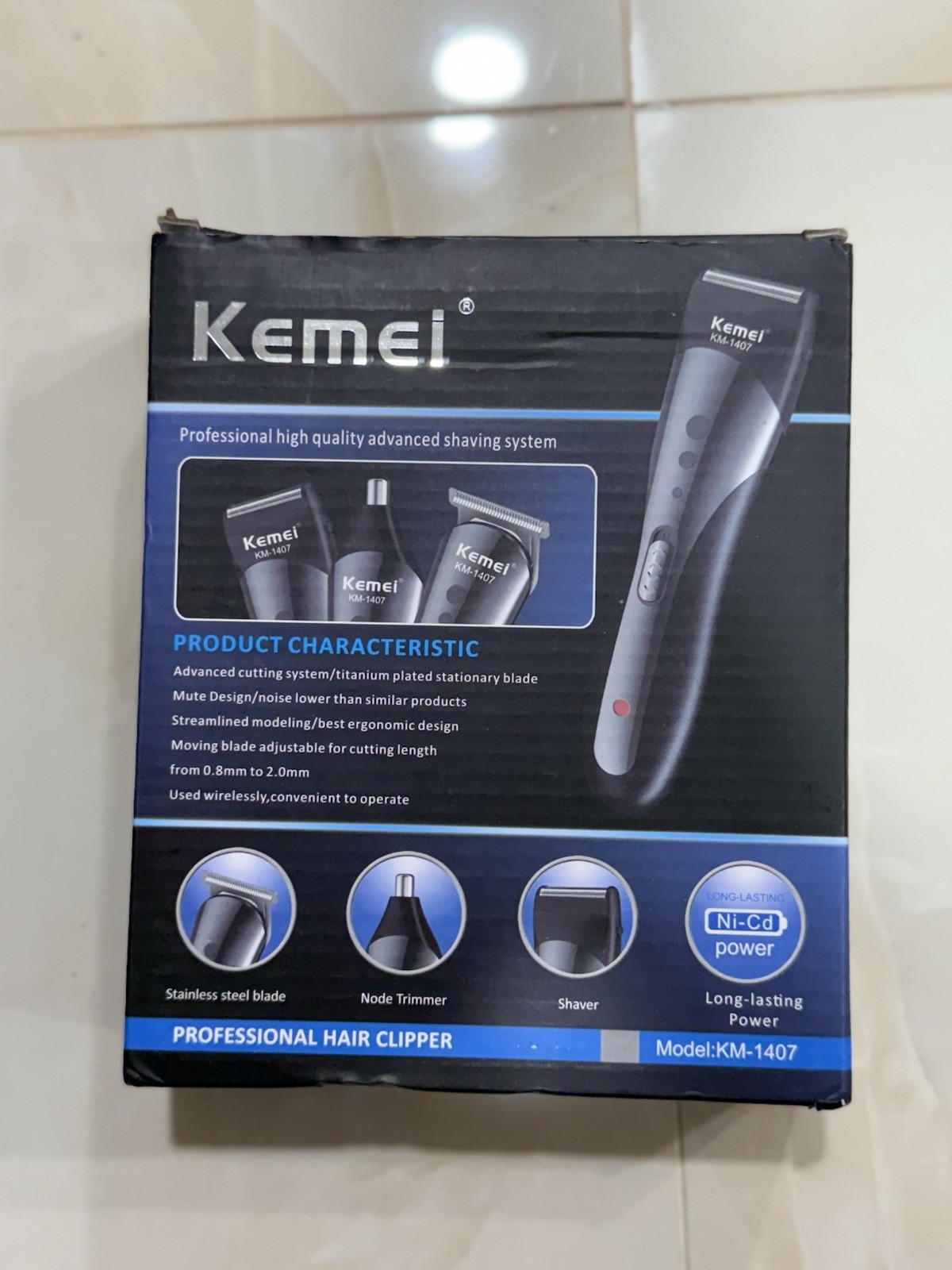Kemei KM-1407 professional 3-in-1 hair clipper and beard trimmer kit, featuring