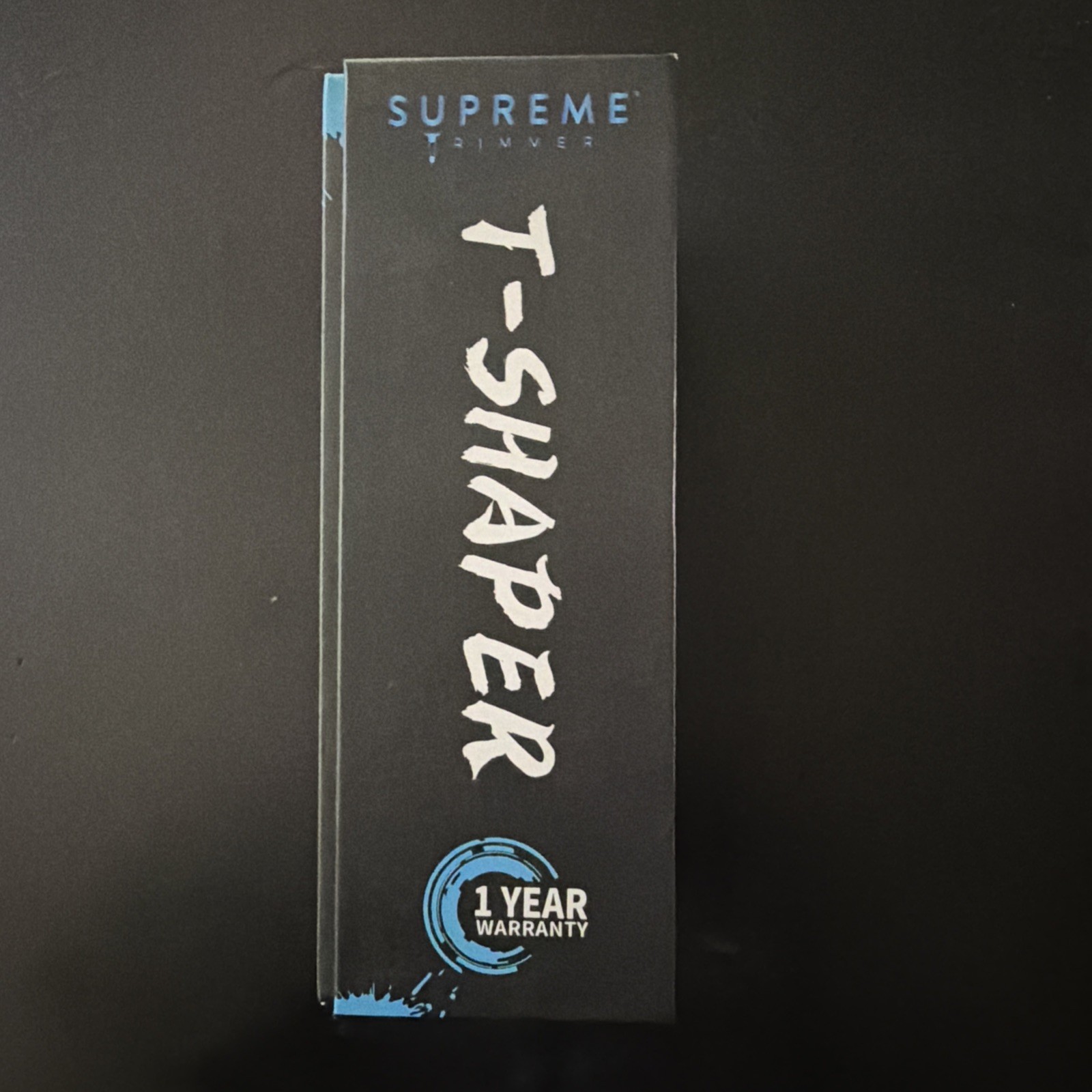 Supreme Trimmer T-Shaper cordless hair trimmer in blue, featuring a DLC blade