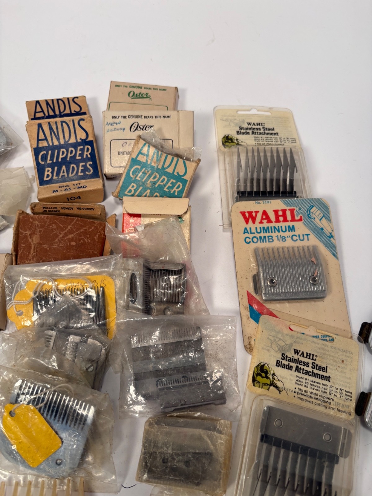 (12) Wahl, Andis, Oster Hair Cutting Clippers and (42) Blades Lot