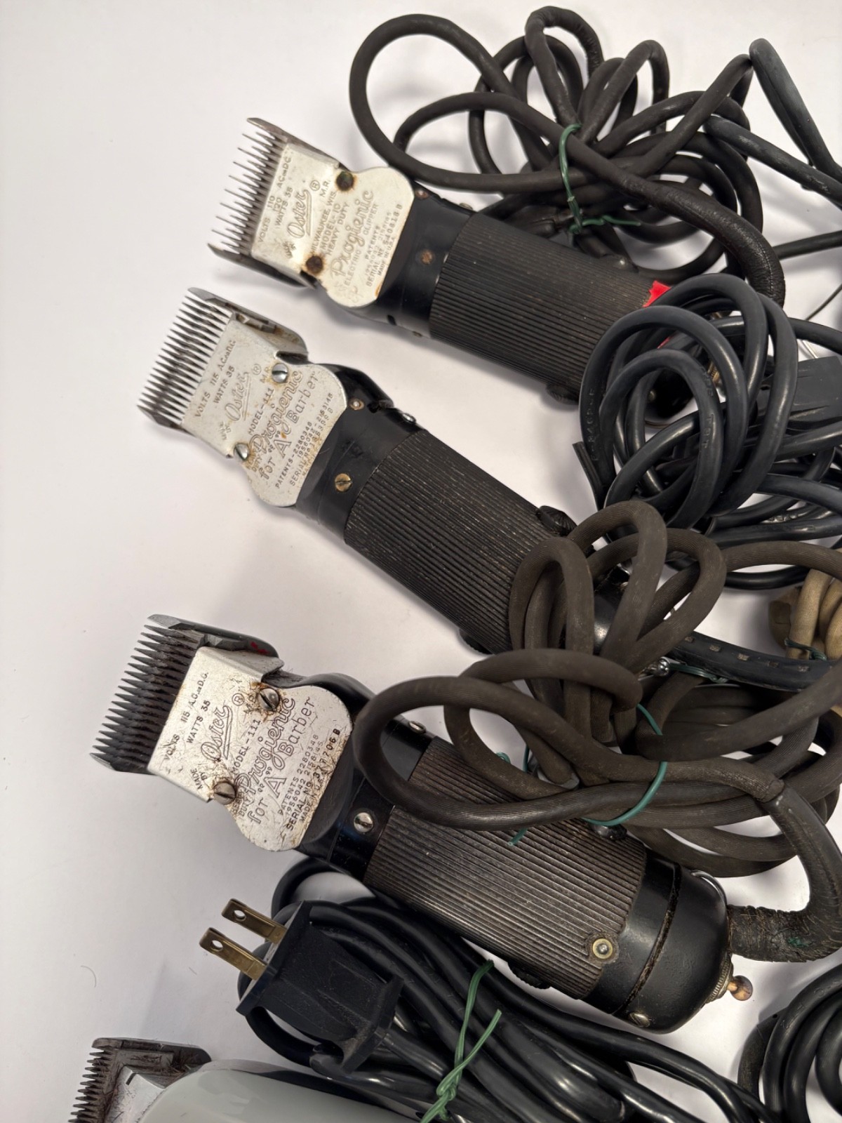 (12) Wahl, Andis, Oster Hair Cutting Clippers and (42) Blades Lot