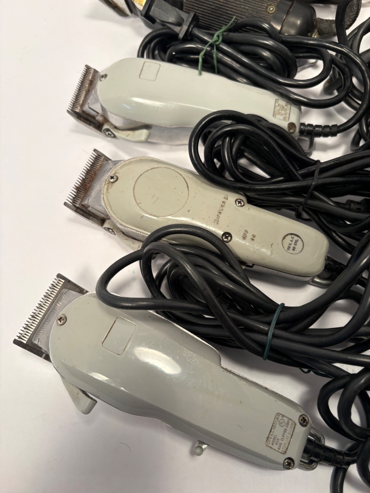 (12) Wahl, Andis, Oster Hair Cutting Clippers and (42) Blades Lot