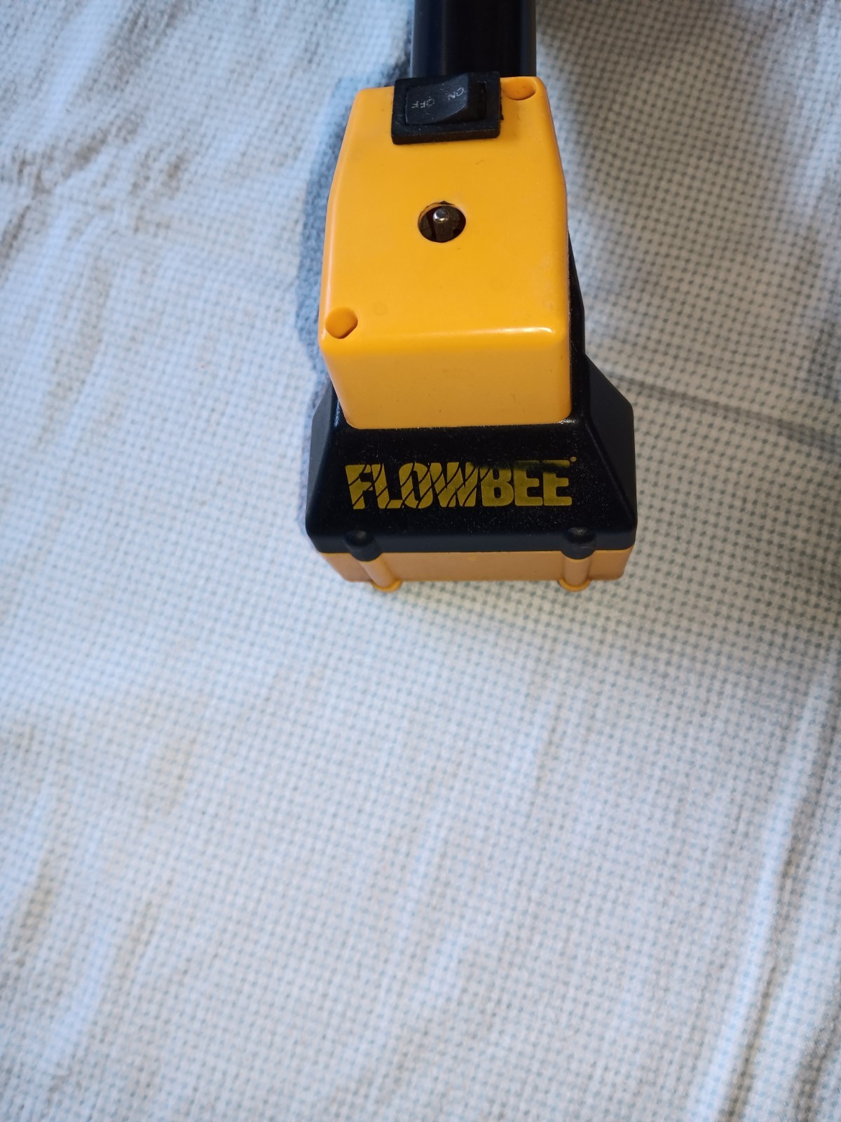 Flowbee Haircutting System tested in box with attachments