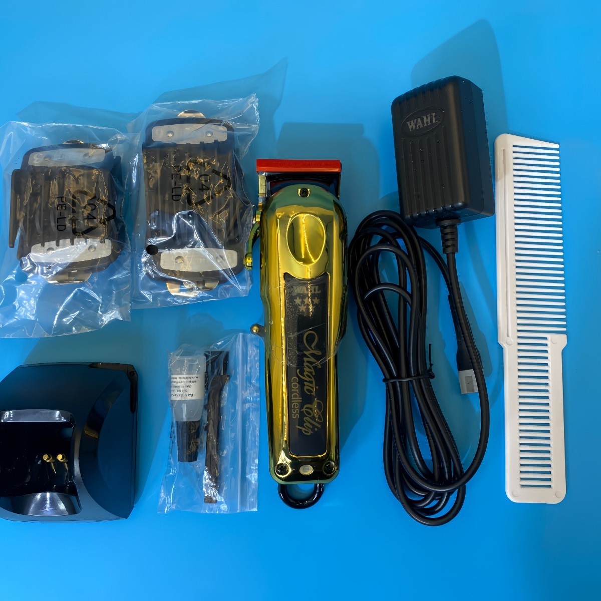 Wahl Professional 5 Star Cordless GOLD MAGIC CLIP Clipper w/ Stand 8148-700